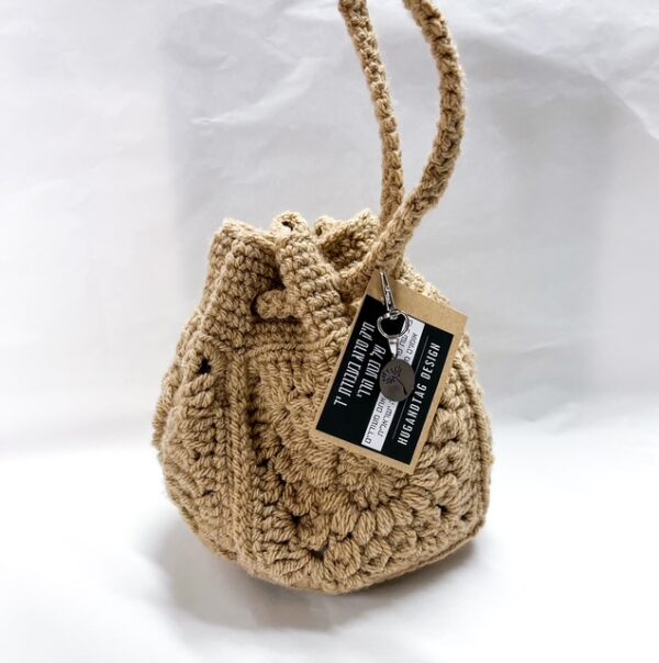 תיק יד ייחודי בעבודת יד של נטע הררי - צבע כאמל